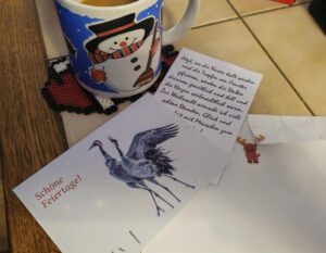 Weihnachtskarte „Schöne Feiertage“.